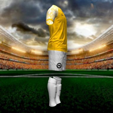 Uniforme de fútbol amarillo con pantalones blancos y número 10 en la parte trasera.